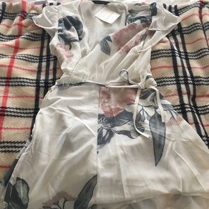 NWT Cute and sexy floral mini wrap dress